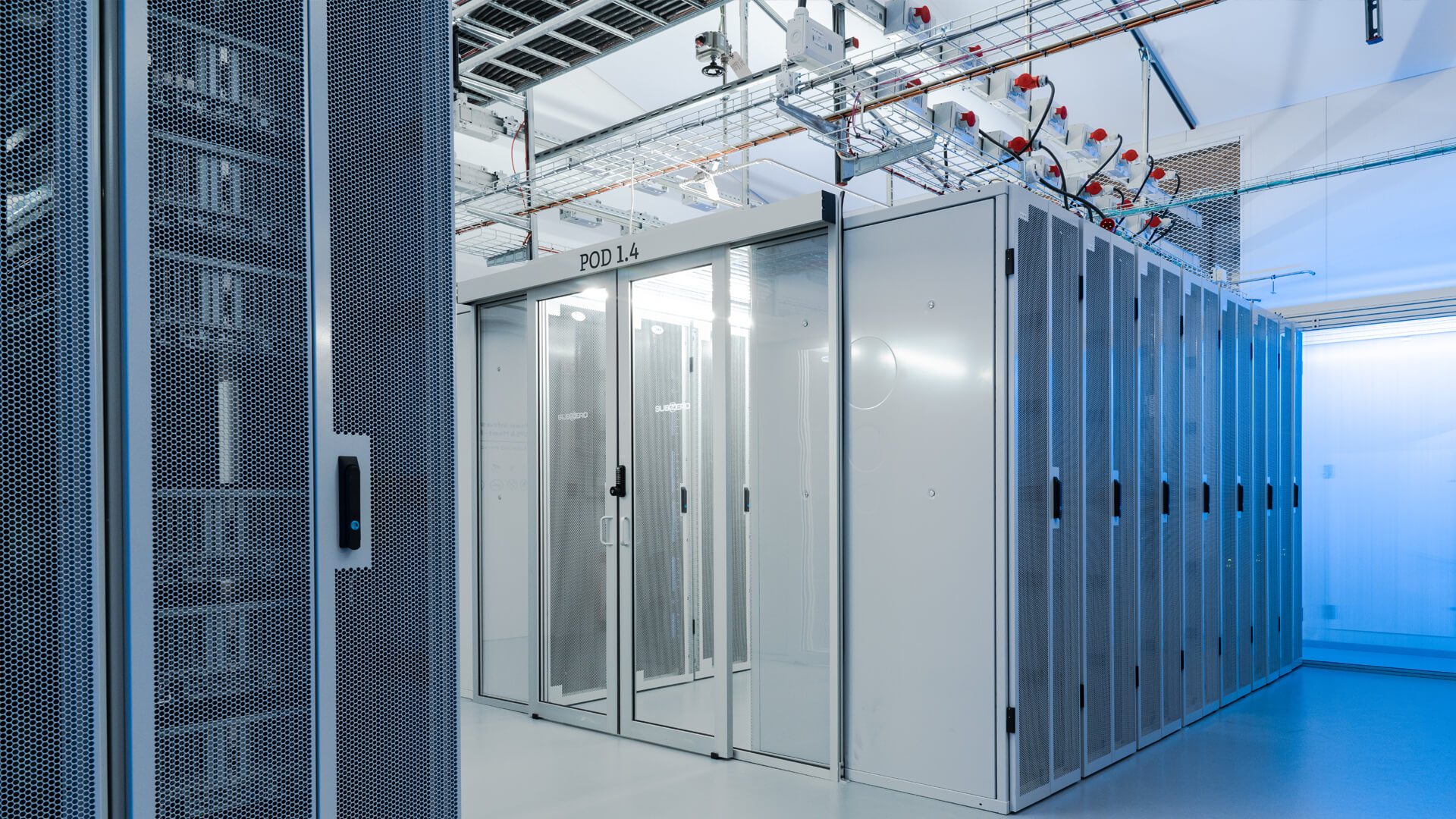 The sleek data center features rows of server racks and visible cooling ducts on the ceiling, epitomizing cutting-edge technology.
