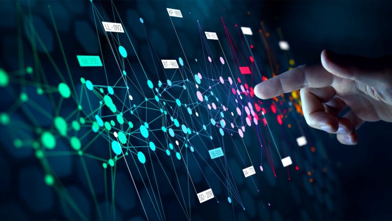 A hand pointing at a colorful, interconnected network diagram with nodes and lines, symbolizing data connections and analysis against a dark background.