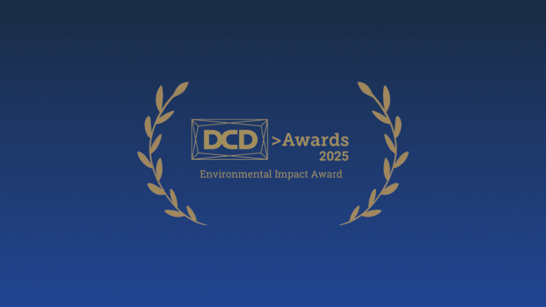DCD Awards 2025 Environmental Impact Award logo with gold laurel branches on a blue background.